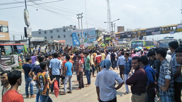 Workers of Abbas Apparels Ltd. demonstrating on Dhaka-Aricha highway on May Day