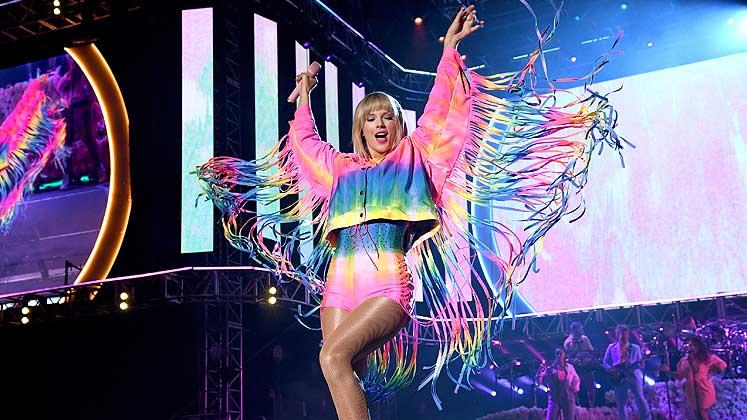 Taylor Swift in Stella McCartney sneakers at the iHeartRadio Wango Tango show