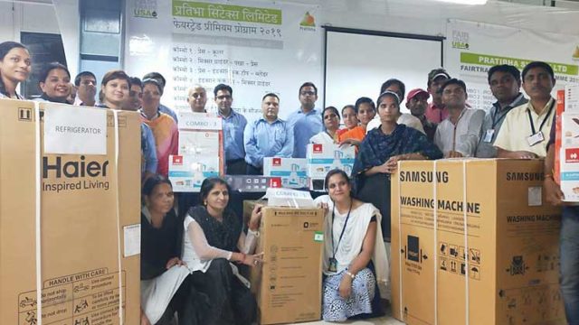 Pratibha Syntex’s workers and senior staff during the event